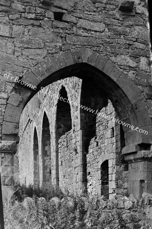 ARCADE OF S.AISLE THROUGH HALF BLOCKED E.ARCH OF S.AISLE (OR TRANSEPT) LOOKING W.